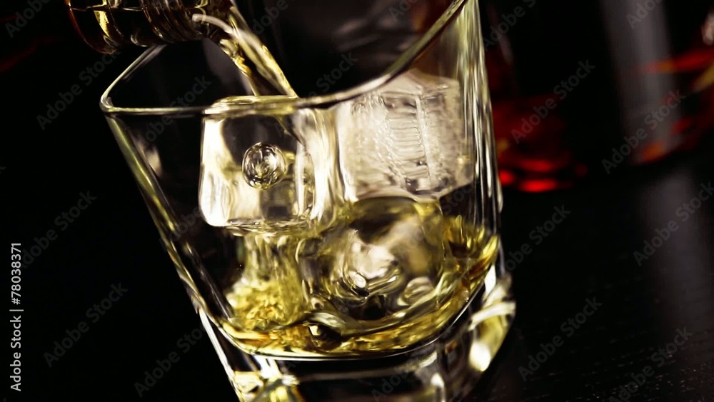 close up pouring whiskey on bar table lounge bar atmosphere close up pouring whiskey on bar table lounge bar atmosphere