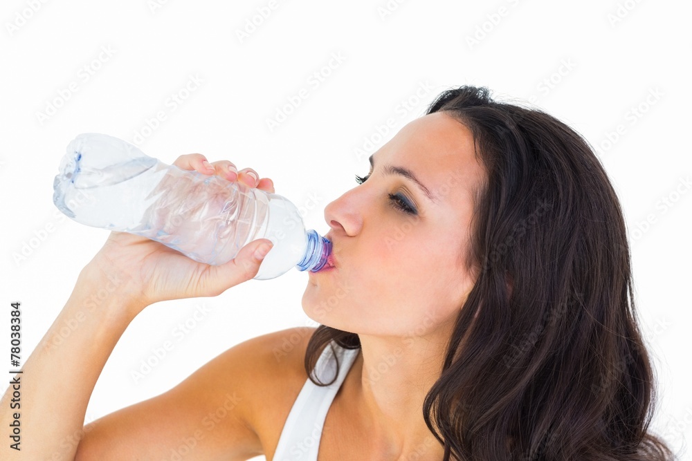 Pretty brunette drinking bottle of water Pretty brunette drinking bottle of water