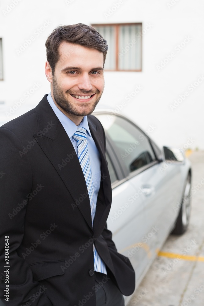 Young businessman smiling at camera Young businessman smiling at camera
