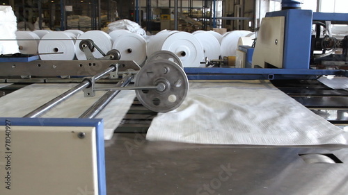 Big polymeric tape roll unreel for a printing press