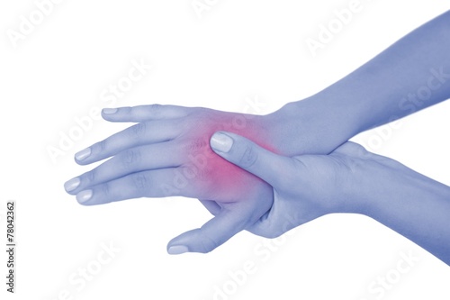 Young woman touching her injured hand © WavebreakmediaMicro
