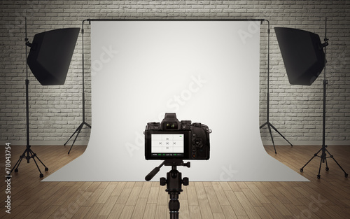 Photo studio light setup with digital camera photo