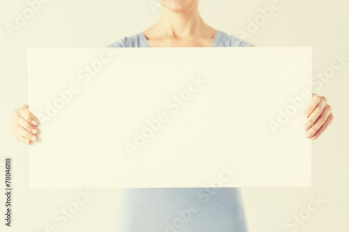 woman with blank white board