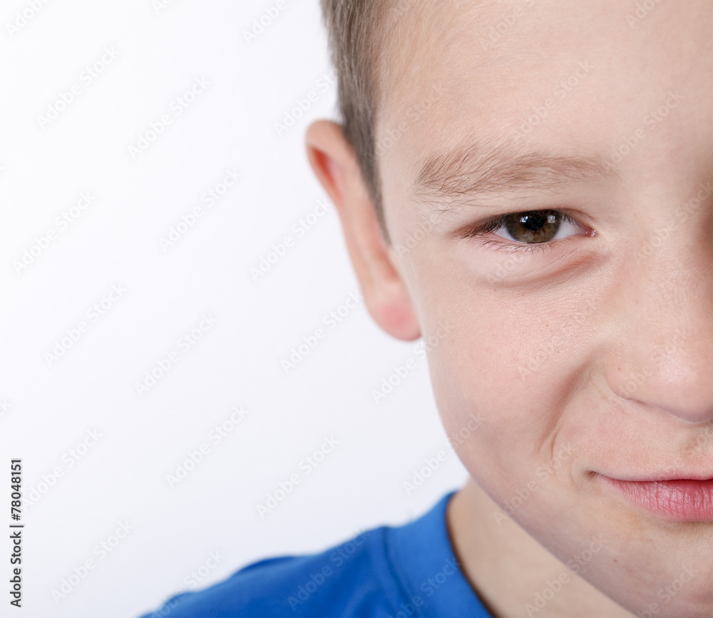 Obraz premium Photo of adorable young happy boy looking at camera.