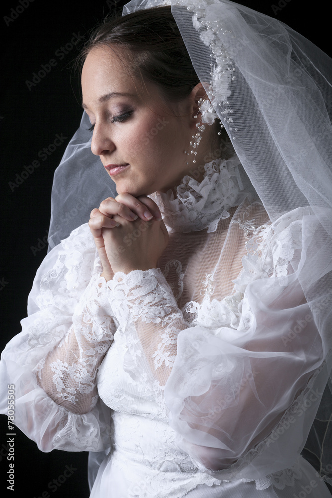 A old bride in a studio black background