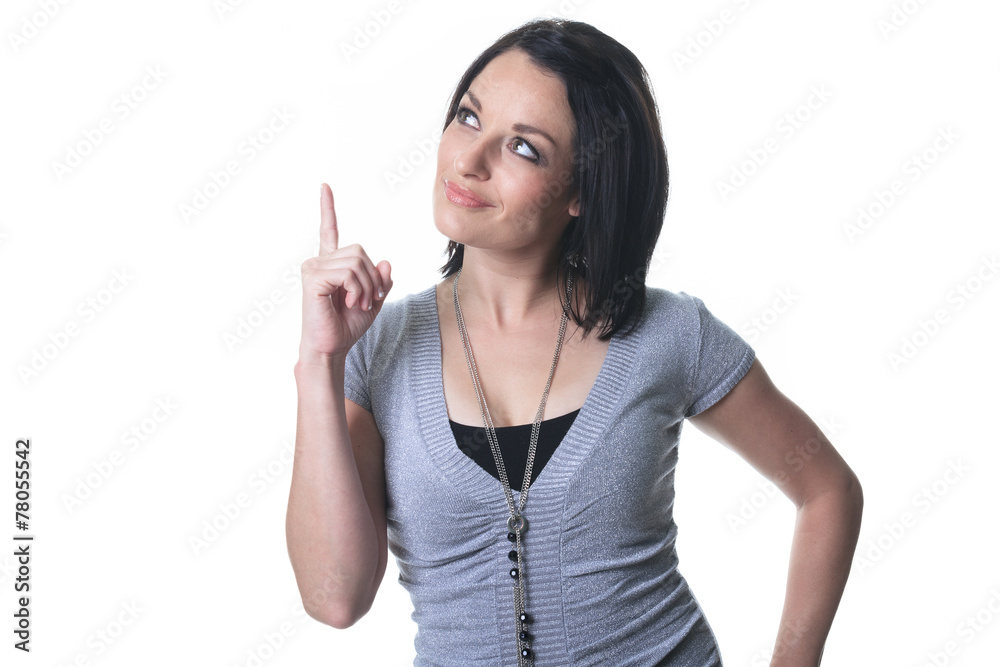 As adult woman pointing in studio white background As adult woman pointing in studio white background
