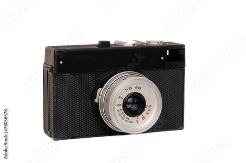 old film camera in cover isolated
