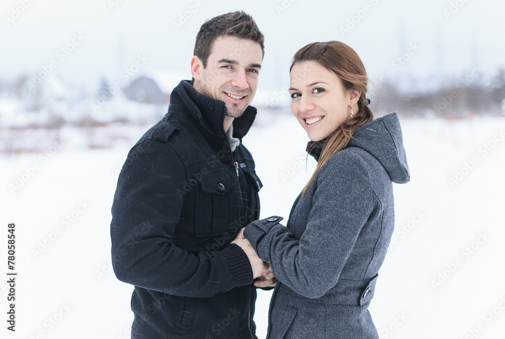 A Young Couple outside in the winter season A Young Couple outside in the winter season