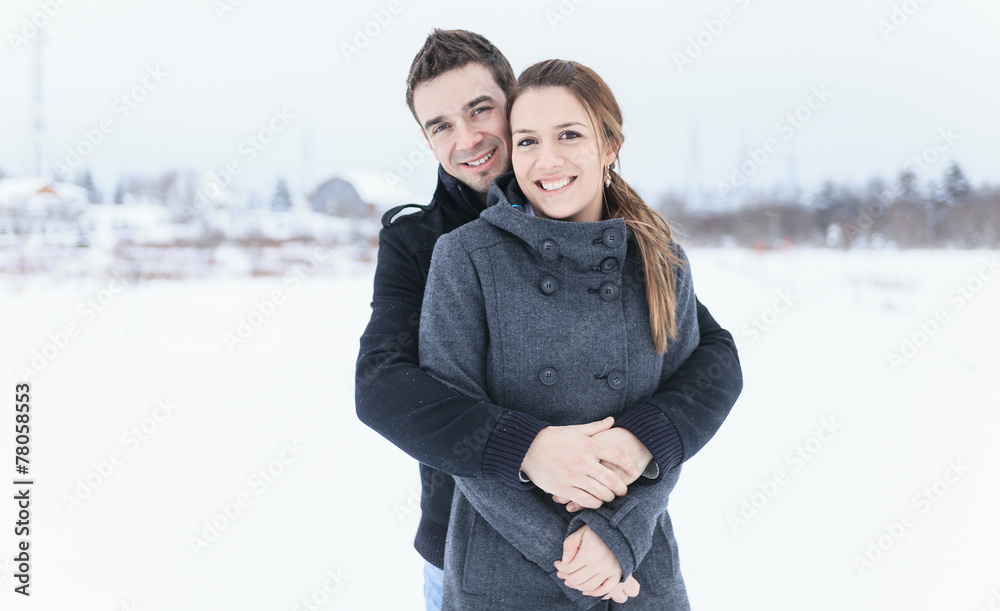 A Young Couple outside in the winter season A Young Couple outside in the winter season