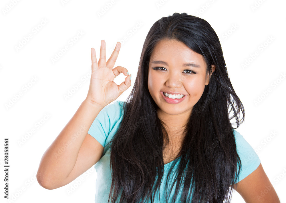 Portrait happy smiling woman showing ok sign Portrait happy smiling woman showing ok sign