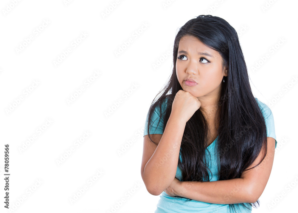 Portrait worried, bothered teenager girl looking puzzled Portrait worried, bothered teenager girl looking puzzled