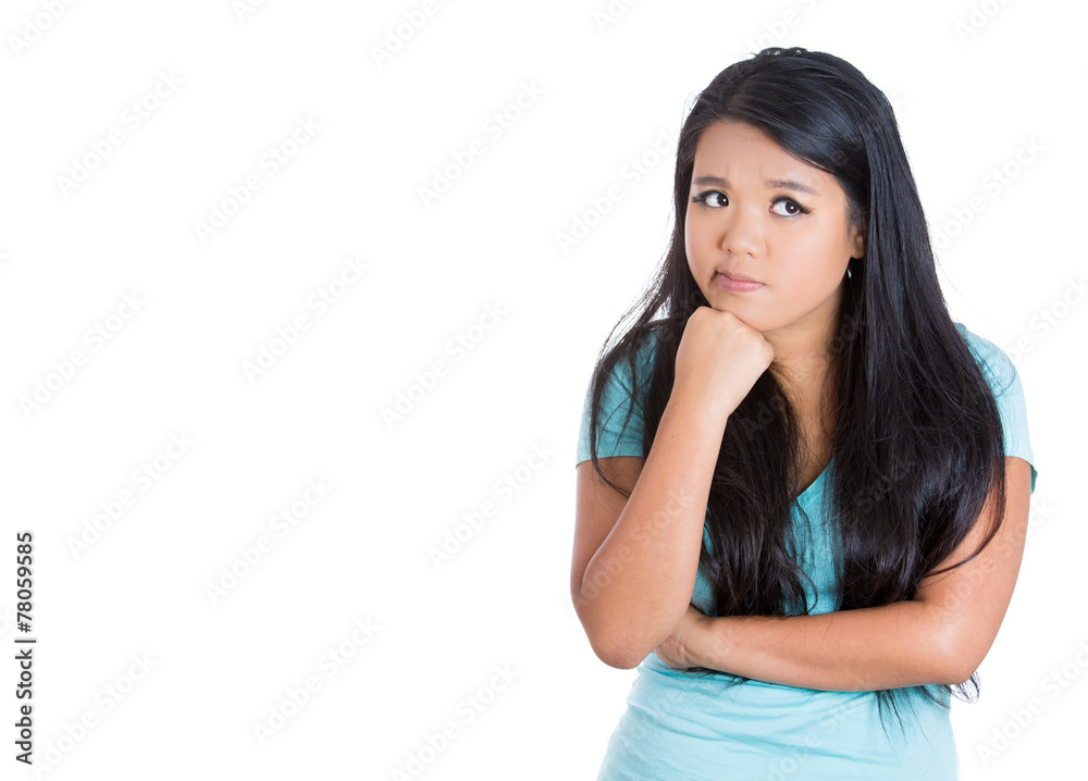 Portrait worried, bothered teenager girl looking puzzled Portrait worried, bothered teenager girl looking puzzled