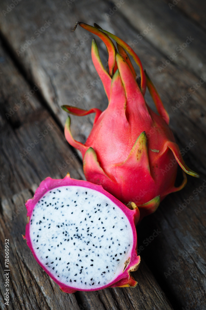 Asian Dragon fruit on the wooden background Asian Dragon fruit on the wooden background