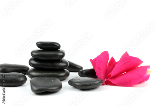 Black spa stones isolated on white..