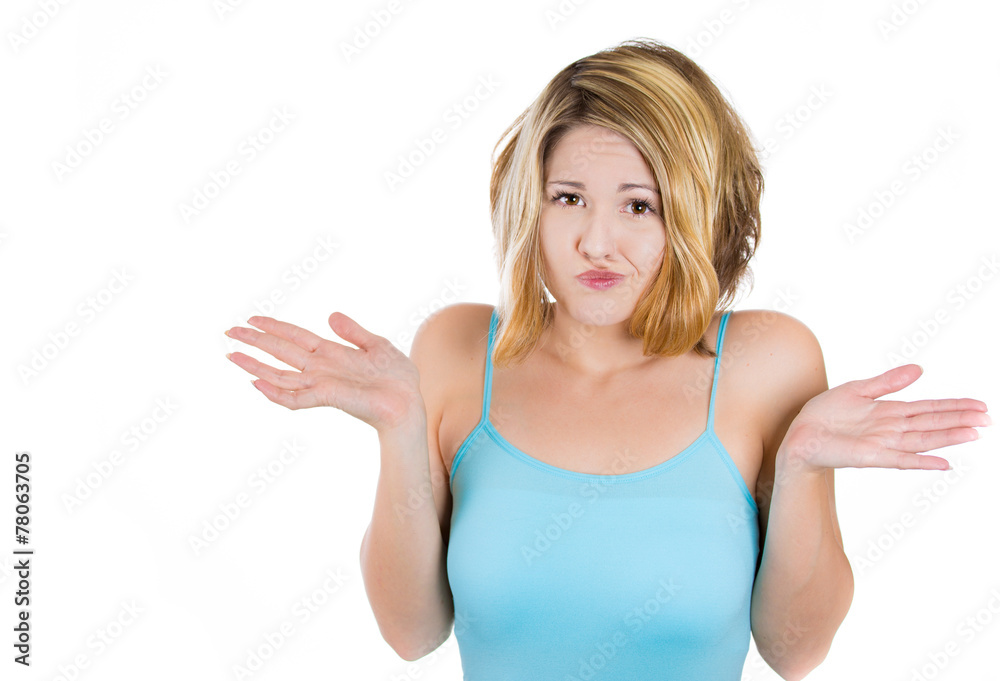 Shrugging woman in doubt doing shrug showing open palms Shrugging woman in doubt doing shrug showing open palms