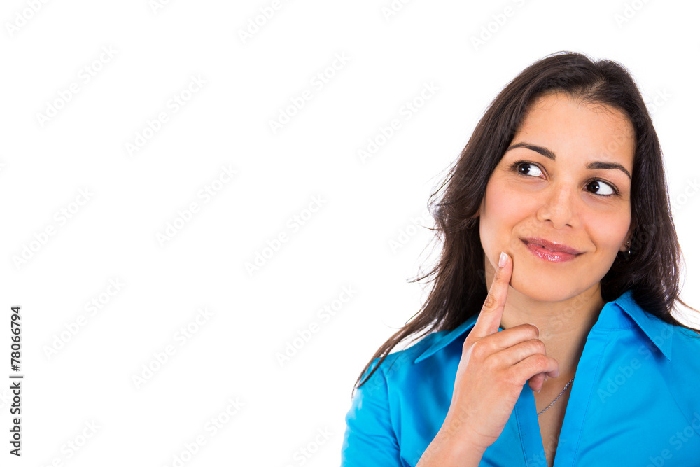 Portrait of a thoughtful woman looking up and smiling Portrait of a thoughtful woman looking up and smiling