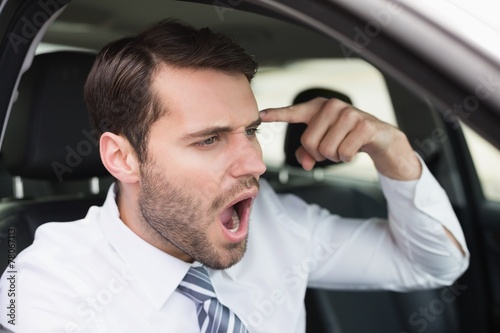 Foto Businessman experiencing road rage