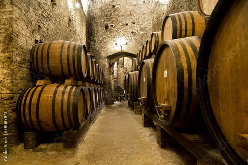 Canvastavla Wine barrels stacked in the old cellar of the winery
