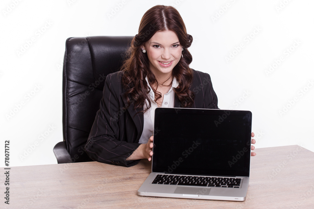 Business woman show the laptop in the office Business woman show the laptop in the office