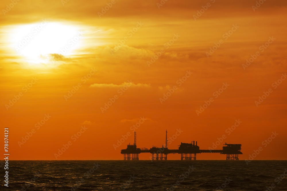 Oil platform on the North Sea at sunset
