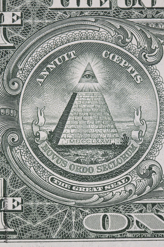 Part of one dollar note with great seal macro