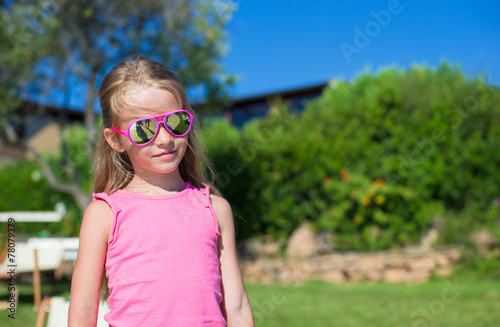 Adorable little girl have fun outdoors