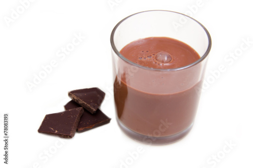 Glass with cocoa drink on white background