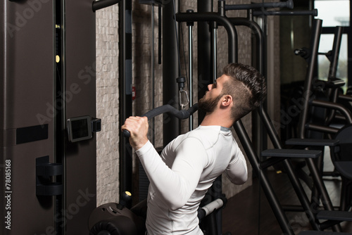 Healthy Young Man Doing Exercise For Back