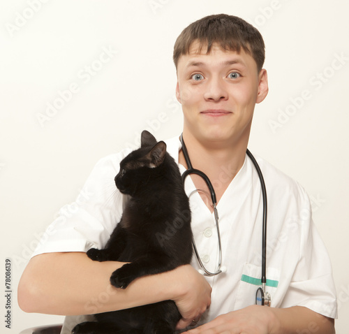 Veterinarian surgeon doctor and cat