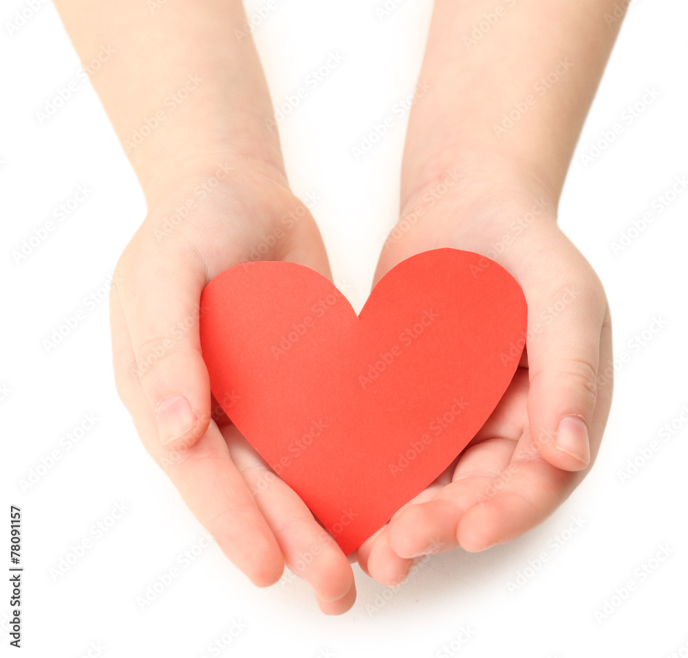Heart in child hands isolated on white Heart in child hands isolated on white