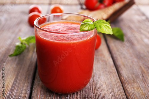 Glass of tomato juice with cherry tomatoes