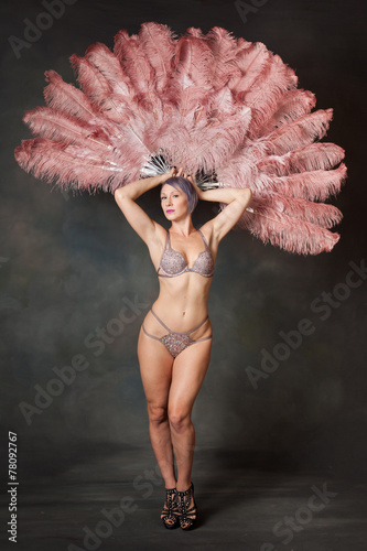 Burlesque dancer with feather fans photo