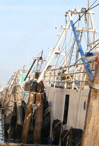 Fishing vessels in sea harbor moored