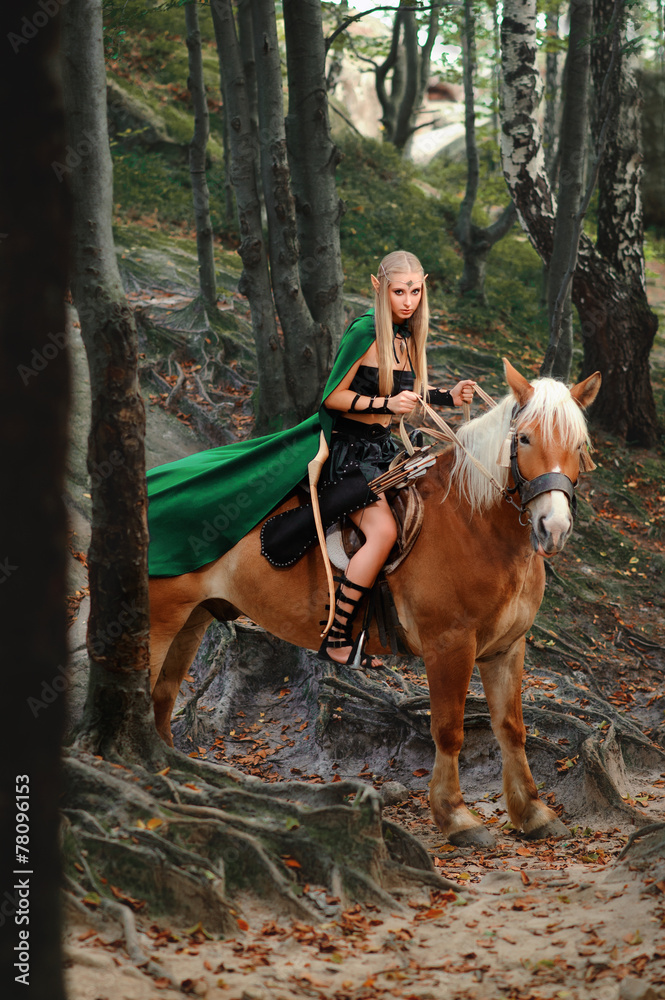 sexy girl elf with a bow on horseback