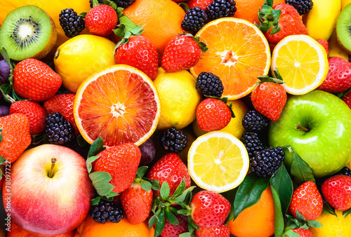 Fotografia Fresh fruits mixed.Tasty fruits background.