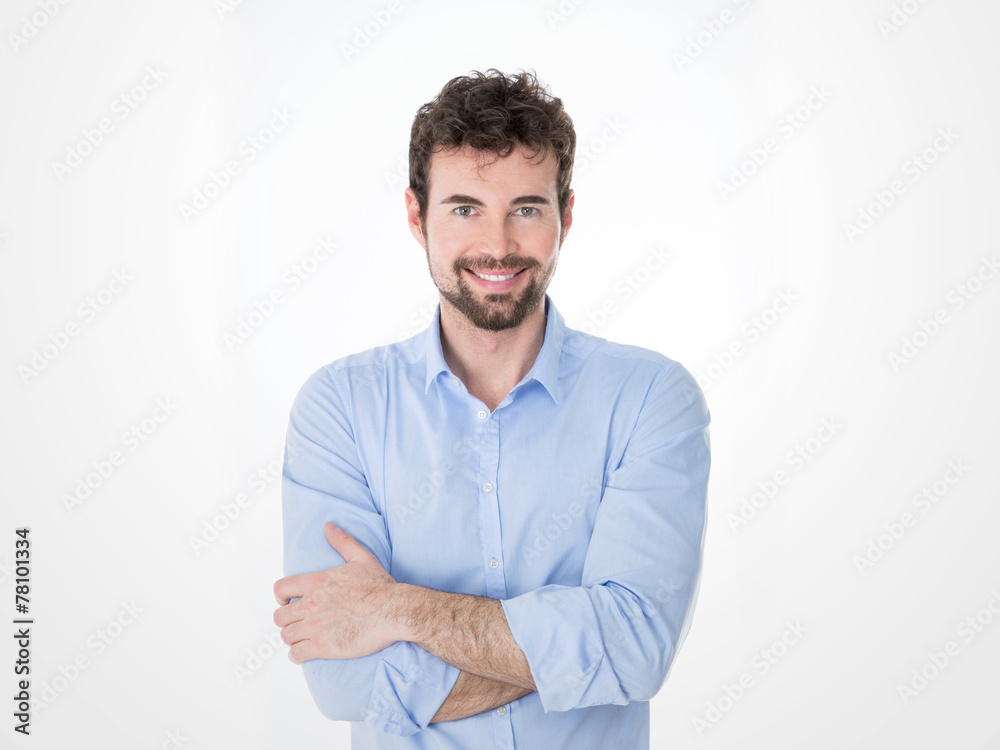 young crossed arms man with shiny smile young crossed arms man with shiny smile