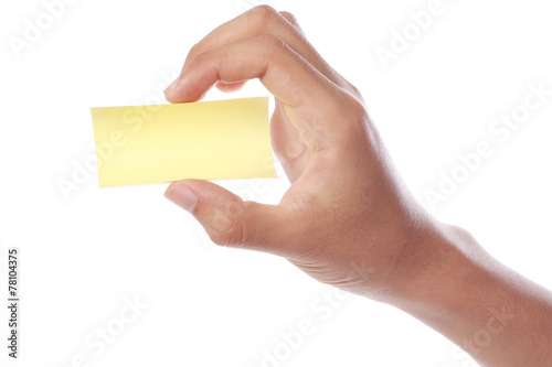 Hand With Yellow Sticky Note