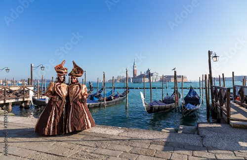 Venice mask during Carnival with gondolas and seascape backgroun © darkside17