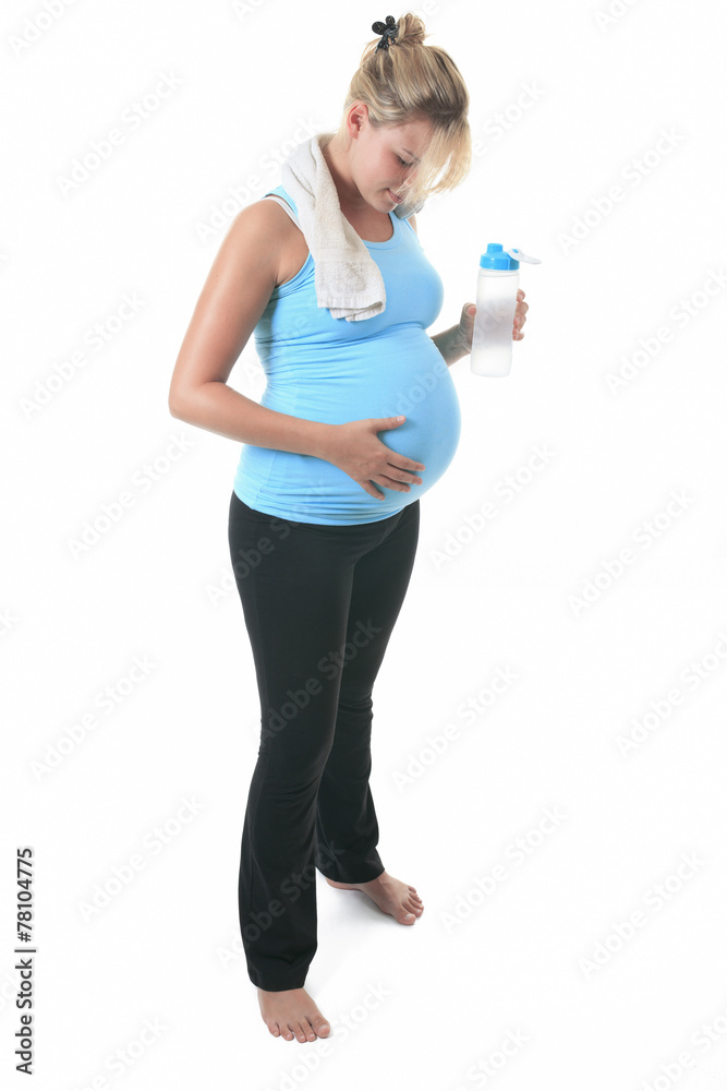 A Pregnant woman with water bottle in studio white background A Pregnant woman with water bottle in studio white background