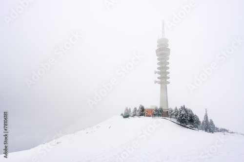 telecommunications tower in winter photo