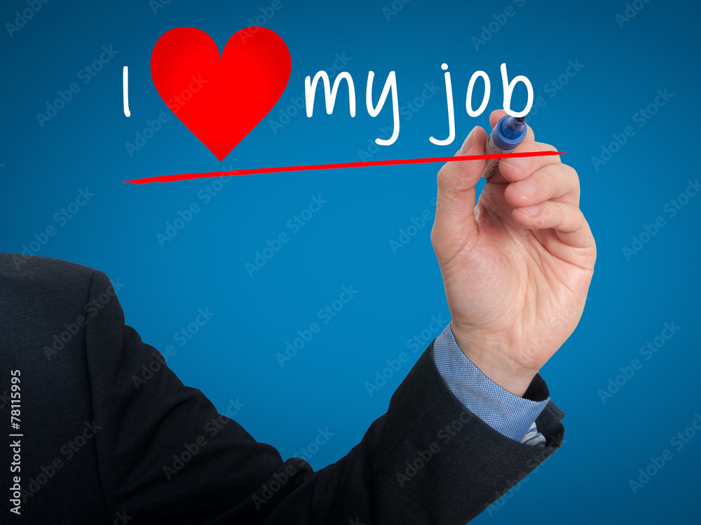 Businessman writing I love my job with heart shape. Businessman writing I love my job with heart shape.