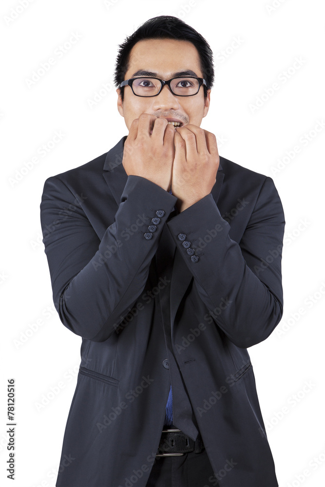 Stressful entrepreneur biting nail Stressful entrepreneur biting nail