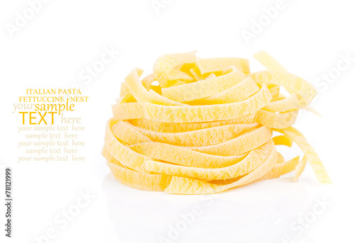 Italian pasta fettuccine nest isolated on white background