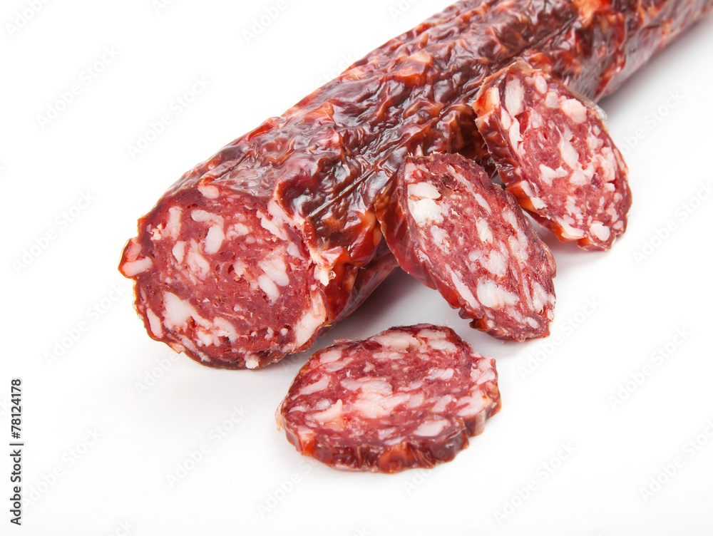 Slices italian salami sausage on white background Slices italian salami sausage on white background