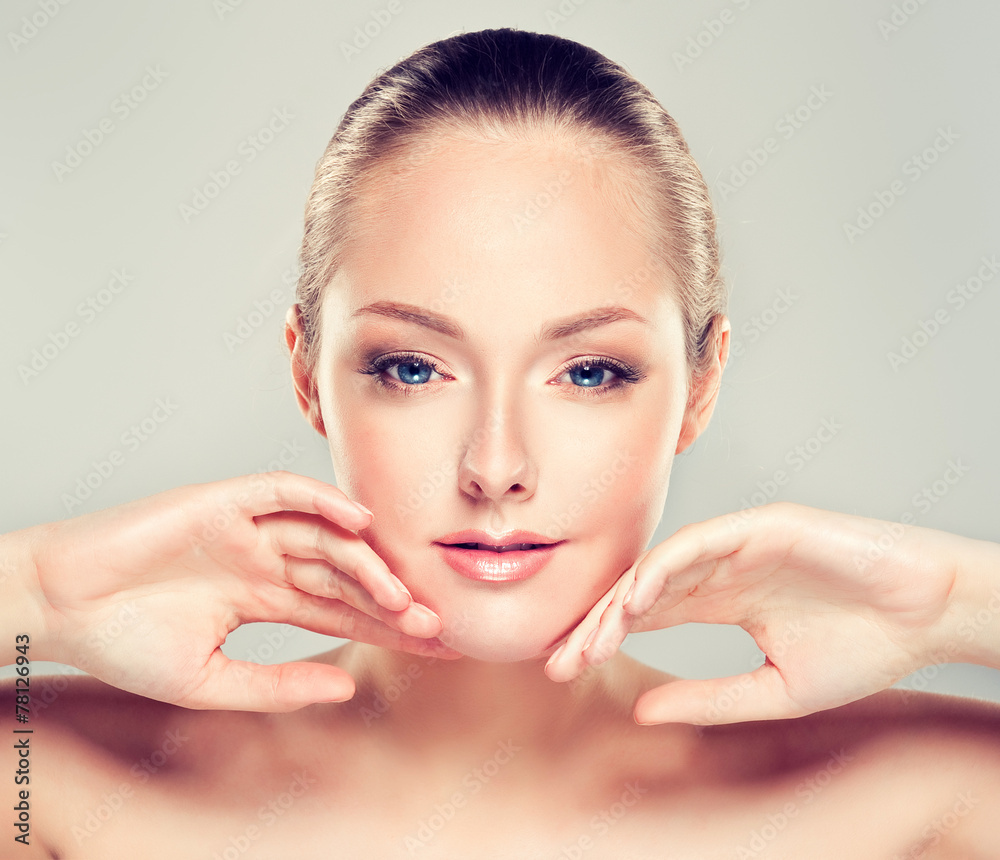 Beautiful Young Woman with Clean Fresh Skin close up