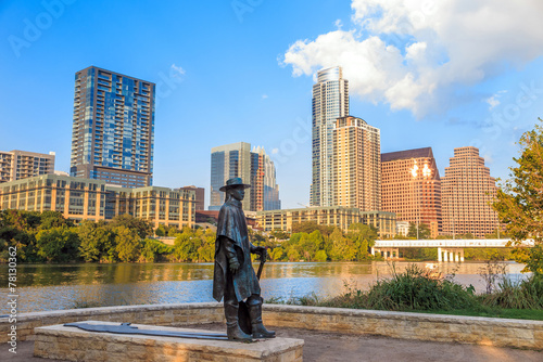 Stevie Ray Vaughan statue in front of downtown Austin and the Co photo