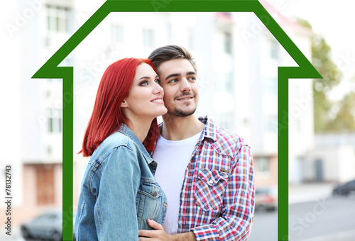Loving couple in drawing house