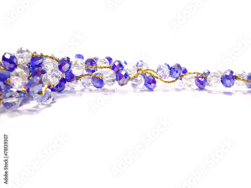 beautiful string of beads necklace isolated on white