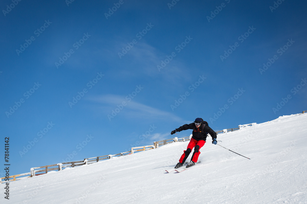 Man sliding on ski Man sliding on ski