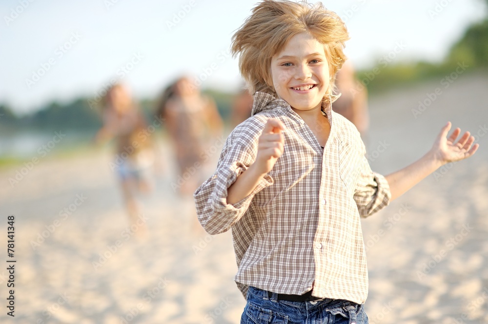 Portrait of children on the beach in summer Portrait of children on the beach in summer